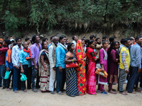 Hindu devotees are waiting in a long queue to pay their obeisance on the occasion of the Raksha Bandhan festival at the Shankaracharya templ...