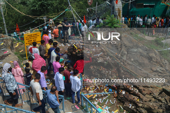 Hindu devotees are performing rituals on the occasion of the Raksha Bandhan festival at the Shankaracharya temple in Srinagar, Jammu and Kas...