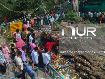 Hindu devotees are performing rituals on the occasion of the Raksha Bandhan festival at the Shankaracharya temple in Srinagar, Jammu and Kas...