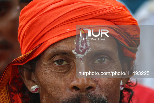 A Hindu devotee is arriving to pay obeisance on the occasion of the Raksha Bandhan festival at the Shankaracharya temple in Srinagar, Jammu...