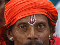 A Hindu devotee is arriving to pay obeisance on the occasion of the Raksha Bandhan festival at the Shankaracharya temple in Srinagar, Jammu...