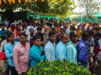 Hindu devotees are waiting in a long queue to pay their obeisance on the occasion of the Raksha Bandhan festival at the Shankaracharya templ...