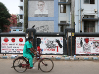 Slogans and graffiti are condemning the rape and murder of a trainee medic at a government-run hospital inside Kolkata Medical College and H...