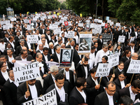 Lawyers of Calcutta High Court are holding posters and participating in a protest rally against the alleged sexual assault and murder of a p...