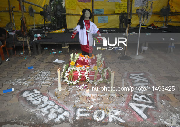 A clay statue of a doctor depicting a victim of rape and murder is being pictured at a protest site in Kolkata, India, on August 19, 2024. 