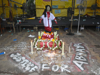 A clay statue of a doctor depicting a victim of rape and murder is being pictured at a protest site in Kolkata, India, on August 19, 2024. (