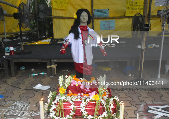 A clay statue of a doctor depicting a victim of rape and murder is being pictured at a protest site in Kolkata, India, on August 19, 2024. 