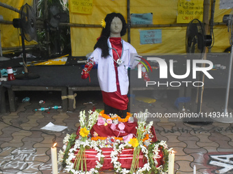 A clay statue of a doctor depicting a victim of rape and murder is being pictured at a protest site in Kolkata, India, on August 19, 2024. (