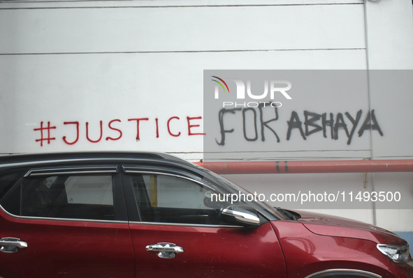 Hospital walls are being painted with slogans inside Kolkata Medical College and Hospital campus condemning the rape and murder of a trainee...