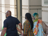 District of Columbia Councilman Trayon White, Sr., center, walks out of the federal courthouse after his initial appearance, Monday, Aug. 19...