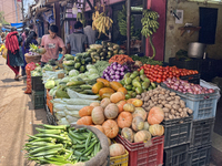 People are purchasing fruits and vegetables at the Chalai market in Thiruvananthapuram, Kerala, India, on April 13, 2024. The Chalai Market...