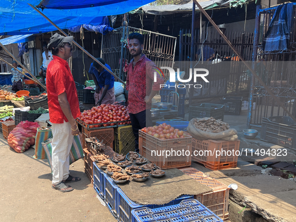 People are purchasing fruits and vegetables at the Chalai market in Thiruvananthapuram, Kerala, India, on April 13, 2024. The Chalai Market...