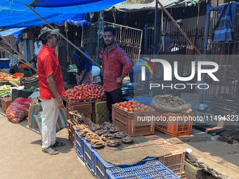 People are purchasing fruits and vegetables at the Chalai market in Thiruvananthapuram, Kerala, India, on April 13, 2024. The Chalai Market...