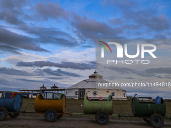 Cattle, horses, and camels are foraging on the grassland in Hulunbuir, China, on August 19, 2024. (