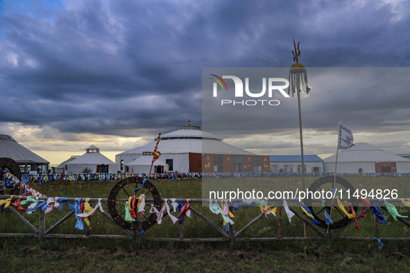 Cattle, horses, and camels are foraging on the grassland in Hulunbuir, China, on August 19, 2024. 