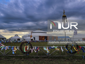 Cattle, horses, and camels are foraging on the grassland in Hulunbuir, China, on August 19, 2024. (