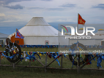 Cattle, horses, and camels are foraging on the grassland in Hulunbuir, China, on August 19, 2024. (