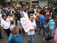 Medical students and doctors are attending a protest rally against the rape and murder of a PGT woman doctor at Government-run R G Kar Medic...