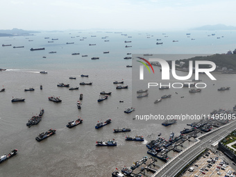 Boats are avoiding Typhoon Jongdari at Shenjiamen fishing port in Zhoushan city, Zhejiang province, China, on August 20, 2024. (