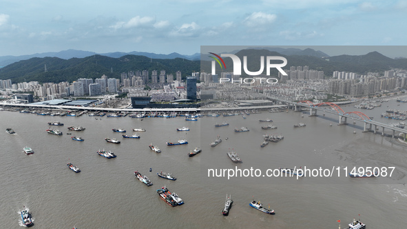 Boats are avoiding Typhoon Jongdari at Shenjiamen fishing port in Zhoushan city, Zhejiang province, China, on August 20, 2024. 