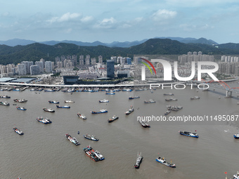 Boats are avoiding Typhoon Jongdari at Shenjiamen fishing port in Zhoushan city, Zhejiang province, China, on August 20, 2024. (