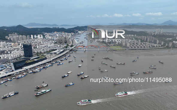 Boats are avoiding Typhoon Jongdari at Shenjiamen fishing port in Zhoushan city, Zhejiang province, China, on August 20, 2024. 