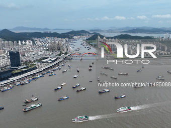 Boats are avoiding Typhoon Jongdari at Shenjiamen fishing port in Zhoushan city, Zhejiang province, China, on August 20, 2024. (