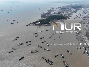 Boats are avoiding Typhoon Jongdari at Shenjiamen fishing port in Zhoushan city, Zhejiang province, China, on August 20, 2024. (