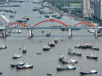 Boats are avoiding Typhoon Jongdari at Shenjiamen fishing port in Zhoushan city, Zhejiang province, China, on August 20, 2024. (