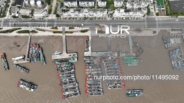 Boats are avoiding Typhoon Jongdari at Shenjiamen fishing port in Zhoushan city, Zhejiang province, China, on August 20, 2024. 