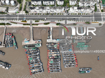 Boats are avoiding Typhoon Jongdari at Shenjiamen fishing port in Zhoushan city, Zhejiang province, China, on August 20, 2024. (