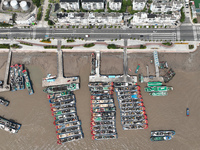 Boats are avoiding Typhoon Jongdari at Shenjiamen fishing port in Zhoushan city, Zhejiang province, China, on August 20, 2024. (