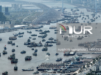 Boats are avoiding Typhoon Jongdari at Shenjiamen fishing port in Zhoushan city, Zhejiang province, China, on August 20, 2024. (