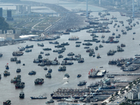 Boats are avoiding Typhoon Jongdari at Shenjiamen fishing port in Zhoushan city, Zhejiang province, China, on August 20, 2024. (