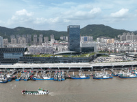 Boats are avoiding Typhoon Jongdari at Shenjiamen fishing port in Zhoushan city, Zhejiang province, China, on August 20, 2024. (