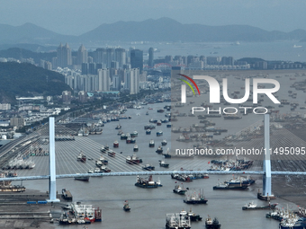 Boats are avoiding Typhoon Jongdari at Shenjiamen fishing port in Zhoushan city, Zhejiang province, China, on August 20, 2024. (