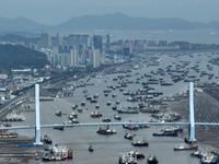 Boats are avoiding Typhoon Jongdari at Shenjiamen fishing port in Zhoushan city, Zhejiang province, China, on August 20, 2024. (