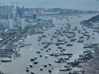 Boats are avoiding Typhoon Jongdari at Shenjiamen fishing port in Zhoushan city, Zhejiang province, China, on August 20, 2024. (