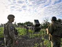 Artillerymen of the 110th Marko Bezruchko Separate Mechanized Brigade who are serving in the Pokrovsk direction are by an RM-70 multiple roc...