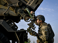 An artilleryman of the 110th Marko Bezruchko Separate Mechanized Brigade who serves in the Pokrovsk direction is operating an RM-70 multiple...