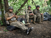 Artillerymen of the 110th Marko Bezruchko Separate Mechanized Brigade are operating an RM-70 multiple rocket launcher in the Pokrovsk direct...