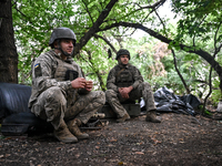 Artillerymen of the 110th Marko Bezruchko Separate Mechanized Brigade are operating an RM-70 multiple rocket launcher in the Pokrovsk direct...