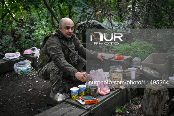 An artilleryman of the 110th Marko Bezruchko Separate Mechanized Brigade is operating an RM-70 multiple rocket launcher in the Pokrovsk dire...