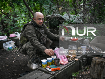 An artilleryman of the 110th Marko Bezruchko Separate Mechanized Brigade is operating an RM-70 multiple rocket launcher in the Pokrovsk dire...