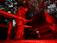 Artillerymen of the 110th Marko Bezruchko Separate Mechanized Brigade who serve in the Pokrovsk direction are loading an RM-70 multiple rock...