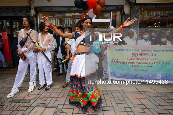 A member of the sexual minority LGBTIQ+ group of Nepal is dancing during the Gaijatra (Pride) parade in Kathmandu, Nepal, on August 20, 2023...