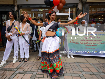 A member of the sexual minority LGBTIQ+ group of Nepal is dancing during the Gaijatra (Pride) parade in Kathmandu, Nepal, on August 20, 2023...