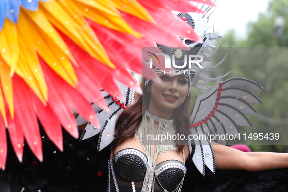 A member of the sexual minority LGBTIQ+ group of Nepal is posing for a photo during the Gaijatra (Pride) parade in Kathmandu, Nepal, on Augu...