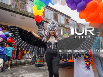 A member of the sexual minority LGBTIQ+ group of Nepal is posing for a photo during the Gaijatra (Pride) parade in Kathmandu, Nepal, on Augu...