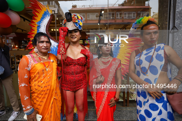 Members of the sexual minority LGBTIQ+ group of Nepal are posing for a photo during the Gaijatra (Pride) parade in Kathmandu, Nepal, on Augu...